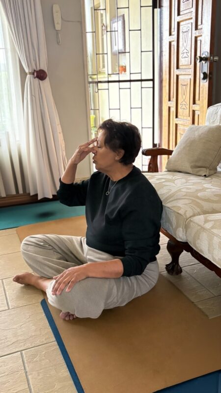 One woman doing a yoga pose