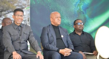 Musa Zondi Member of the Executive Council for Economic Development, Tourism and Environmental Affairs in KZN with Premier Thami Ntuli at the Dundee July with another person.