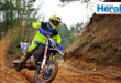 Image of motorcycle rider on a dirt road during an enduro competition.