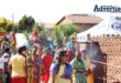 A group of people taking part in a Hindu Religious Festival.