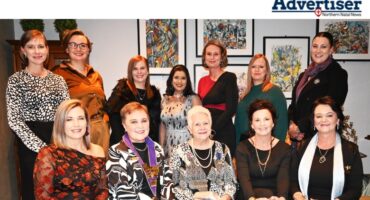 A large group photo of the Newcastle Lions Club.