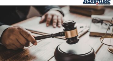 An image of a judges gavel in a courtroom.