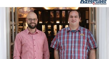 African Sky Hotels and Resorts Director, Michael Hagemann and Newcastle Inn General Manager Johan Pieterse pose in front of a newly renovated bar.