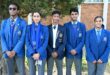 Image of top learners from Sarel Cilliers High School in uniform standing next to each other.