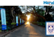 Image of Hoërskool Pionier's entry road to the school with emblem.