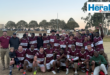 Image of Vryheid Rugby team with a trophy.