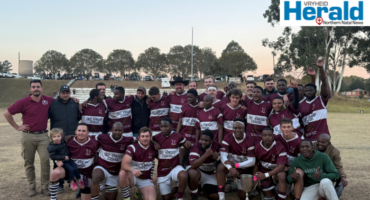 Image of Vryheid Rugby team with a trophy.