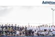 A group photo of young tennis players taken in Newcastle.