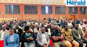 A group image of AbaQulusi councillors as well as community members at the Imbizo that tackled undocumented immigrants and business permits in Vryheid.