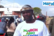 An image of Mduduzi Buthelezi outside the Hlobane Court as they show support to the three members of March and March organisation after their arrest.