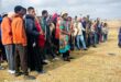 Image of young men lined up at a men's camp in Nquthu.