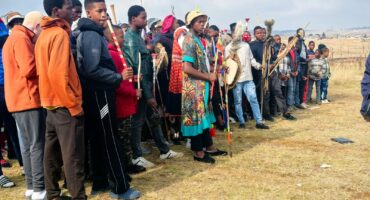 Image of young men lined up at a men's camp in Nquthu.