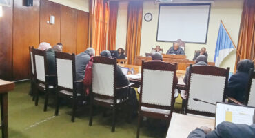 Image of Endumeni councillors seated around the chamber horseshoe.