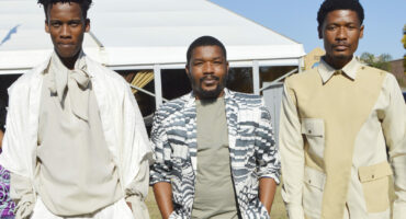 Milan-trained Mxolisi Mkhize, founder and designer of House of Saint Luke, with models showing off his designs at the Dundee July media launch.