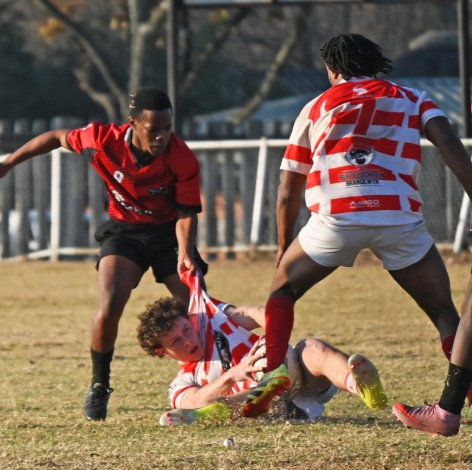 An action photo of Highlanders VS Whiteriver captured on the field.