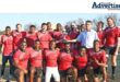 Chairman of the Boshckpick Newcastle Highlanders Rugby Club, Alistair van Wyk, presents the NRSU League trophy to the Newcastle Highlanders' third team.