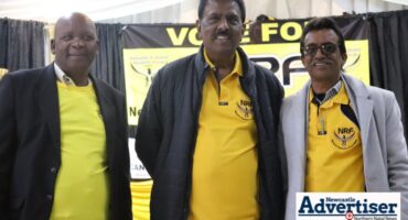 A photo of Sam Mhlangeni, Matthew Shunmugam and Neil Sooknanan of the Newcastle District and Residents Forum.