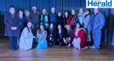 Image of a group of men and women.