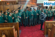 Image of learners who are part of a choir in church.