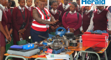 A group image of learners at an exhibit during the Mthashana TVET month celebration. Learners were taught about different career fields they can pursue after high school in colleges.