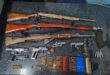 Image of seized firearms and ammunition.