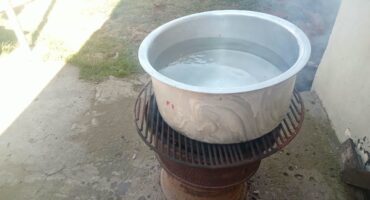 Image of a pot on a gas cooker.