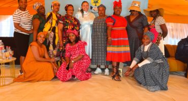 Group of women dressed for a SAPs women's day focus event.
