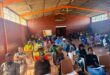 Image of people sitting in a hall in Glencoe.