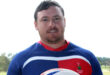 Image of Sentraal rugby captain Xander Kriel in his kit holding a ball.