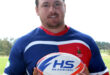 Image of Sentraal rugby captain Xander Kriel in his kit holding a ball.