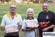 A photo of Wessie van der Westhuizen and Yolanda Boshoff receive their prizes of frozen chicken products from Keith Solomon of Jeremiah Meats.