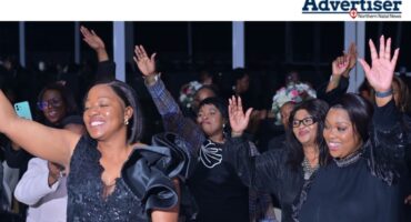 A photo of women dressed up during the Amajuba District Women's Gala Evening.