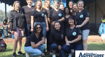 A group photo of the The Newcastle Lions Club ladies posing at the Newcastle Golf Club.