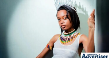 A portrait photo of a young woman posing in traditional attire and a grown.