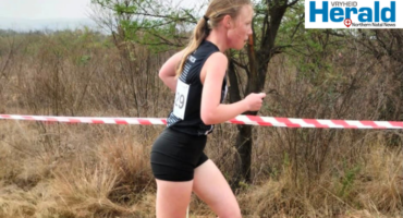 Image of a girl running a long-distance event.