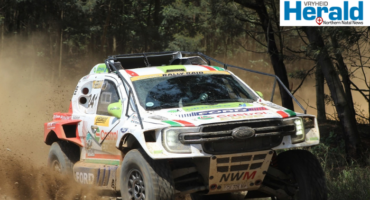 Image of a Rally-Raid car in action.