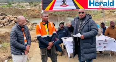 An image of AbaQulusi Mayor Sifiso Mkhanazi, Mr Ndlovu, the newly appointed contractor and an engineer who will work at Emarasteni Bridge in Bhekuzulu Vryheid.