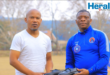 An image of two man, one of them is a soccer legend in Vryheid who lives and breathes football. Through soccer, he opened a foundation that conducts school shoes donation drive to support learners in need.