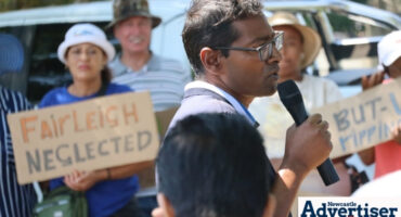 Faizel Cassim addresses the crowd ahead of the march.