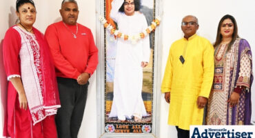 Dr Pravesh Bhoodram with the family who founded the Shanmuga Goushala: Sarica, Pops and Latavia Govender.