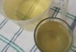 Image of brown coloured water in containers.