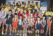 Image of Rhino wrestlers group standing together with their medals.