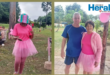 Image of runners and walkers dressed in pink.