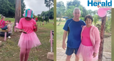 Image of runners and walkers dressed in pink.