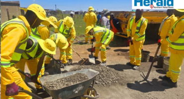 An image of KZN Department of Transport workers hard at work repairing and rehabilitating the R34, which connects Vryheid with Nquthu, Newcastle and Mpumalanga.