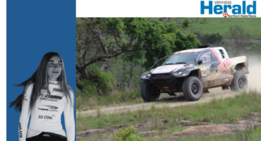 Image of Puck Klaassen and her rally vehicle.