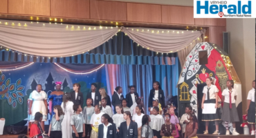 A group image of Michaelis Private School learners on stage during the school production as they bring the magic of Alice in the Lost and Found to life through drama, singing and dancing.