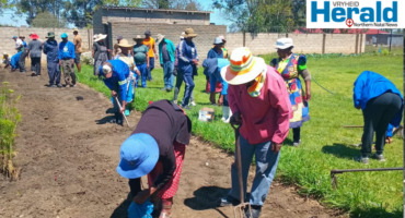 An image of Mondlo Methodist Church members as they were taught to grow their own food by the Department of Agriculture.