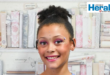An image of Mylee-Grace Merkle, a young author from Vryheid who launched a motivational student diary o inspire children to embrace their differences, build confidence and practise self-love.