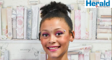 An image of Mylee-Grace Merkle, a young author from Vryheid who launched a motivational student diary o inspire children to embrace their differences, build confidence and practise self-love.